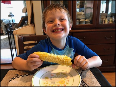 Ryan-eating-corn-9-4-20